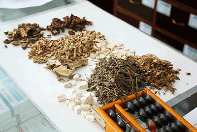 A prescription of Chinese herbal medicine being filled in Beijing. (Source: http://jimmiescollage.com)